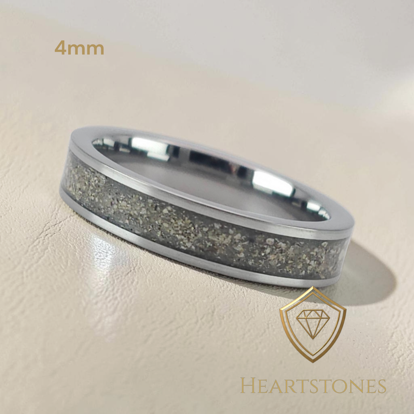 “Tungsten 4mm memorial band ring with crushed ash inlay, flush set and meticulously finished by hand by Heartstones®”