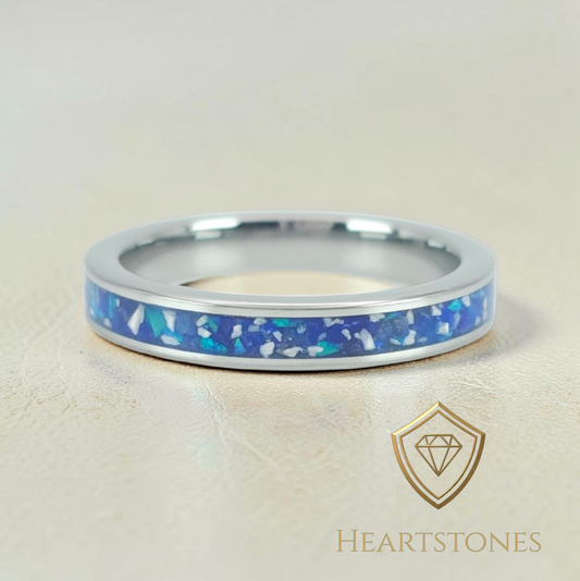 “Sterling silver memorial band ring with blue ash and opal inlay, flush set and meticulously finished by hand by Heartstones®”