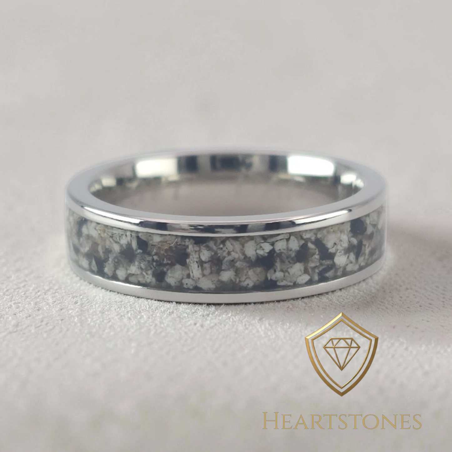 “Sterling silver memorial band ring with pure ash inlay, flush set and meticulously finished by hand by Heartstones®”
