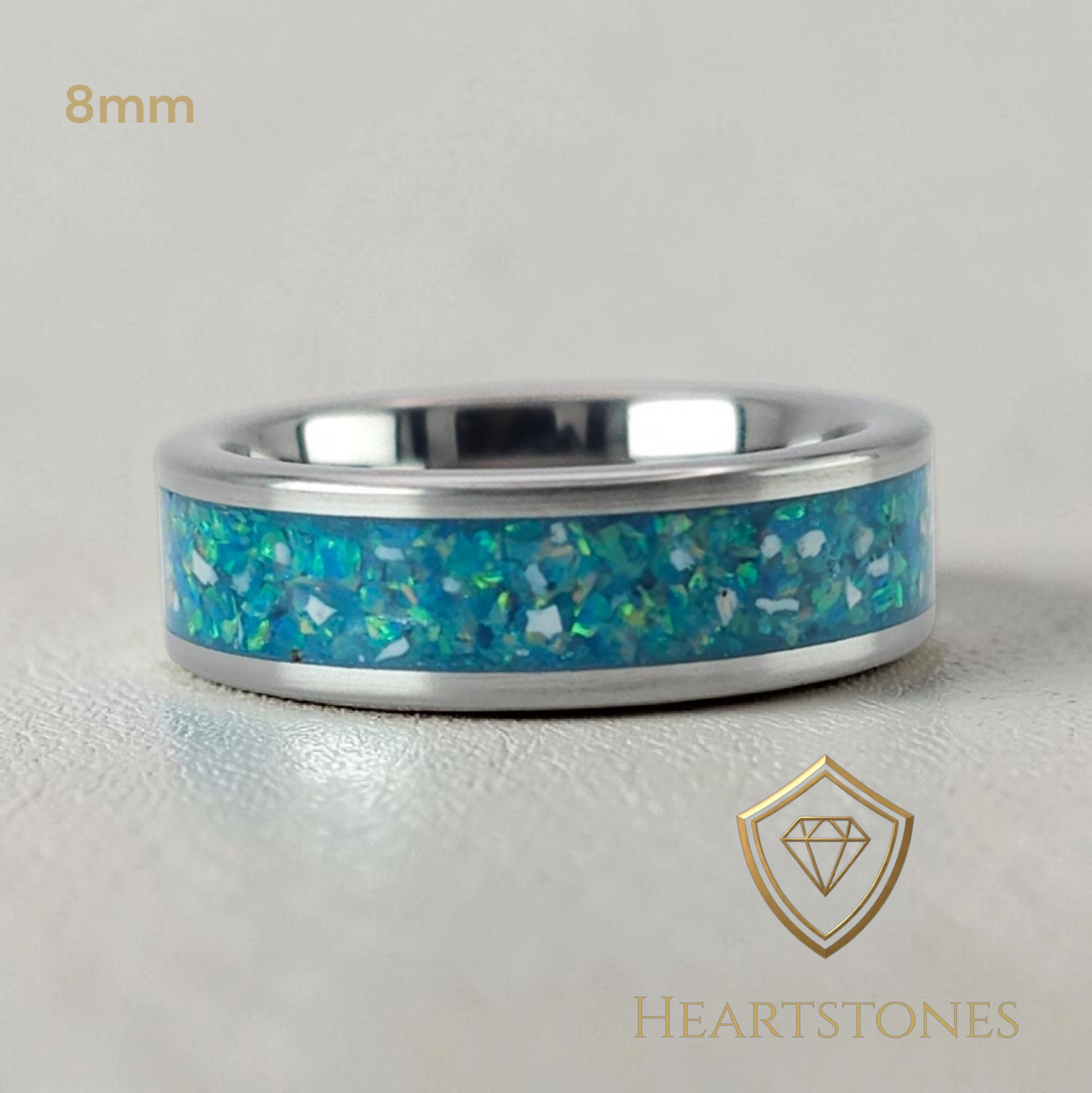 “Tungsten memorial band ring with blue opal inlay, flush set and meticulously finished by hand by Heartstones®”