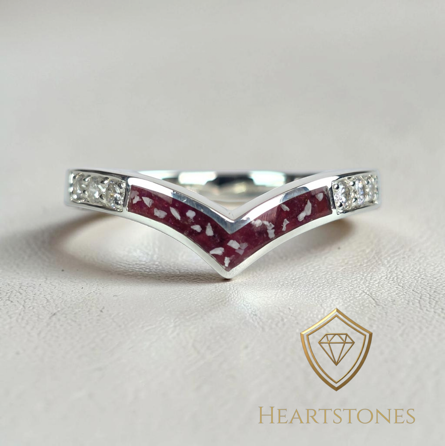“Sterling silver wishbone memorial ring with red ash inlay and pavé set shoulders, meticulously finished by hand by Heartstones®”