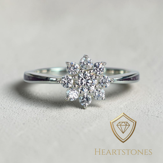 “Sterling silver floral cluster ring with round brilliant stones, meticulously finished by hand by Heartstones®”