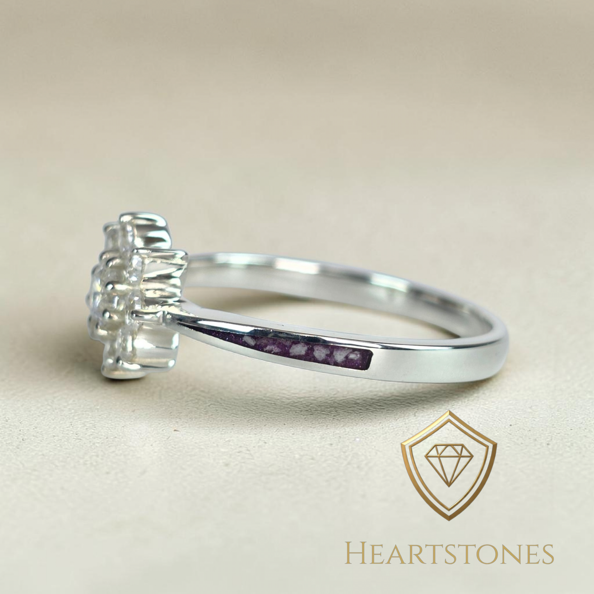 “Sterling silver floral cluster ring with round brilliant stones, meticulously finished by hand by Heartstones®”