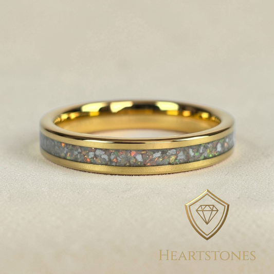 “Gold memorial band ring with ash and opal inlay, flush set and meticulously finished by hand by Heartstones®”