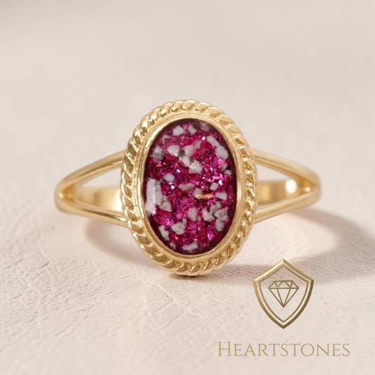 “Gold memorial ring with oval ash and pink opal inlay in rope bezel setting, meticulously finished by hand by Heartstones®”