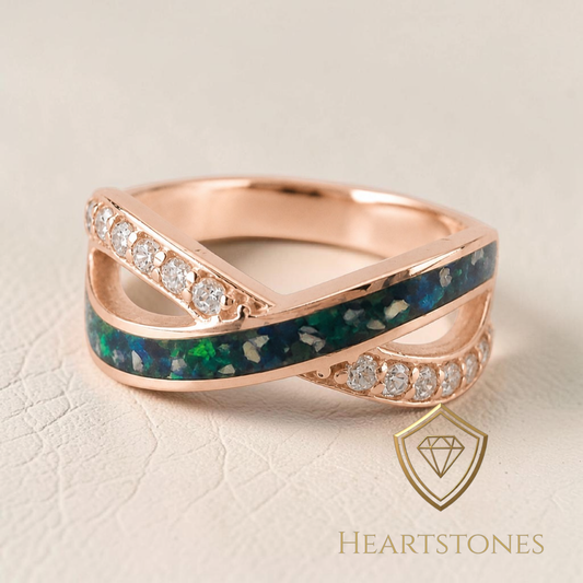 “Rose gold crossover memorial ring with green ash inlay and pavé set stones, meticulously finished by hand by Heartstones®”