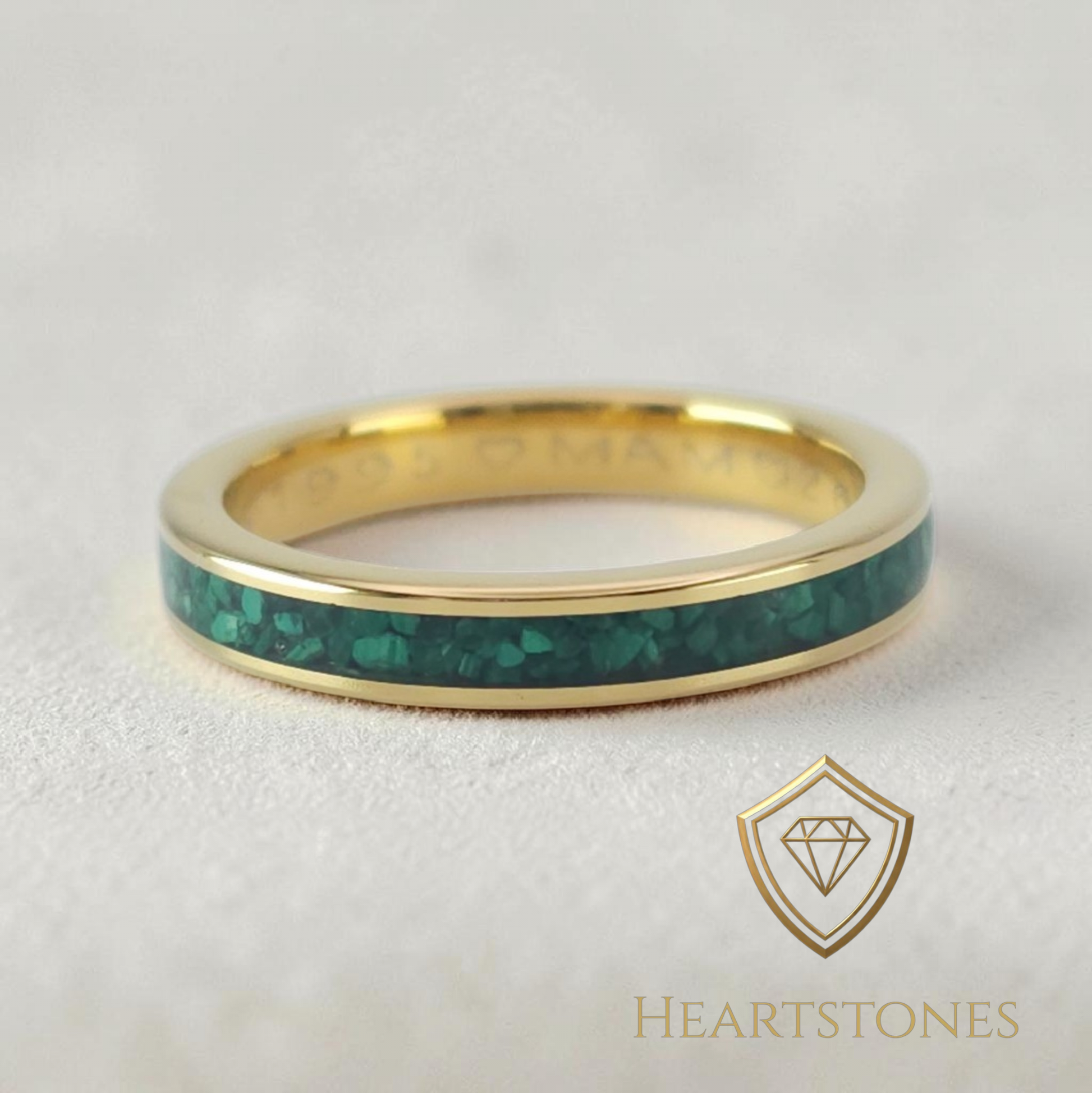 “Gold memorial band ring with green ash inlay, flush set and meticulously finished by hand by Heartstones®”